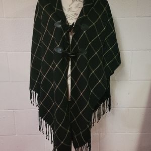 Cape with toggle closure